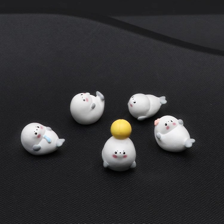 One set of six Little Seals - Comes with traceless adhesive