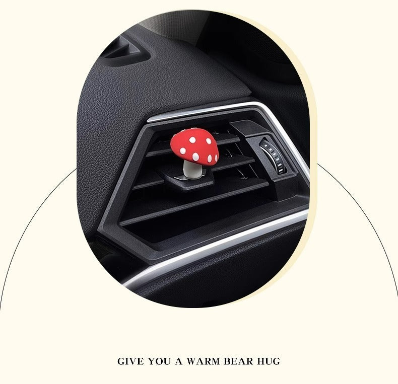 Red mushrooms, one big and one small