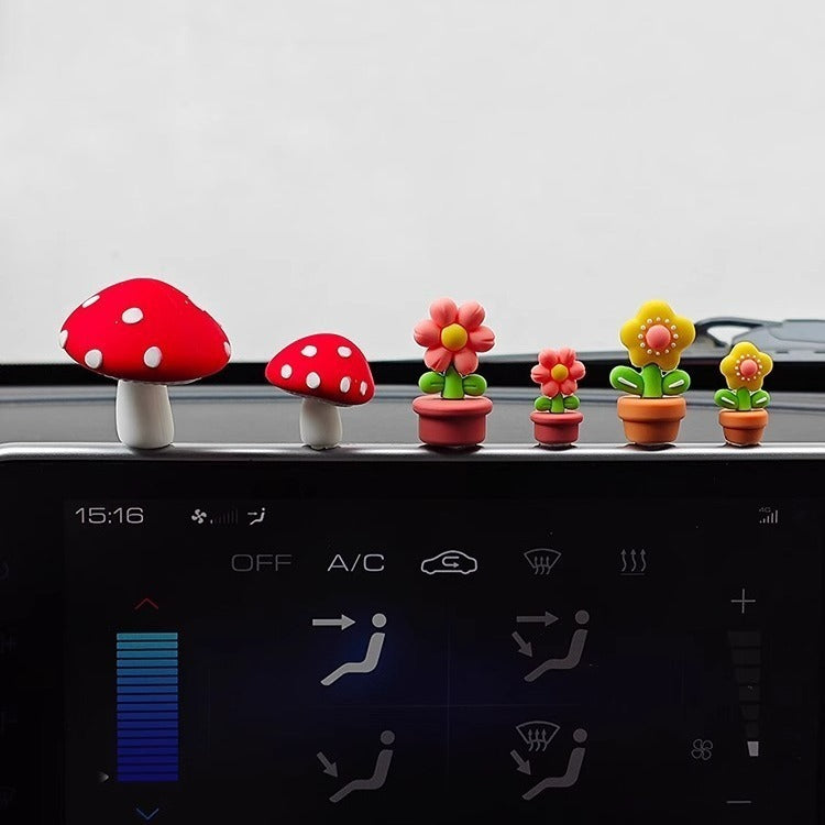 Red mushrooms, one big and one small