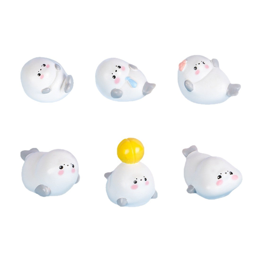 One set of six Little Seals - Comes with traceless adhesive